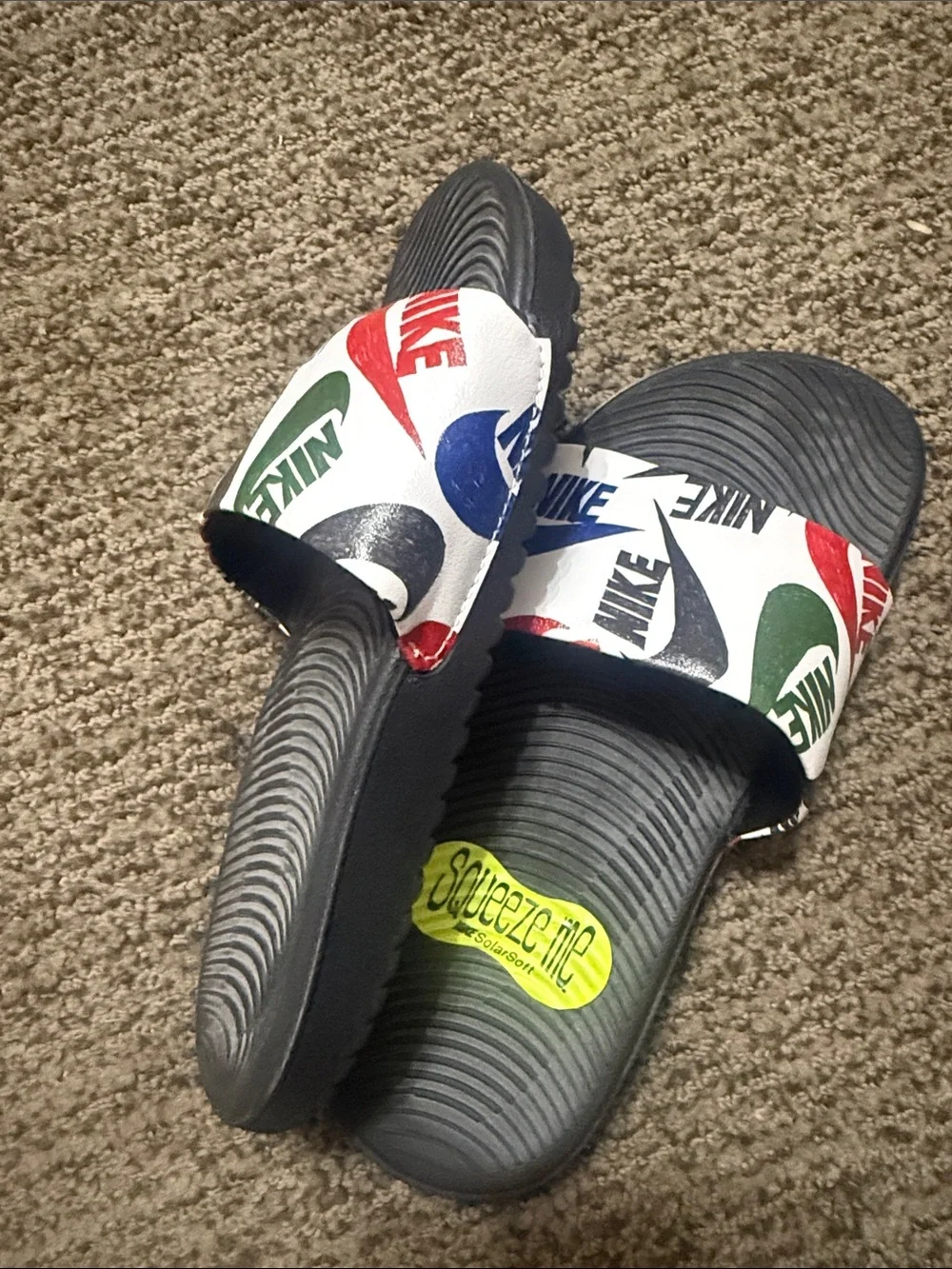 Nike Kids Black Slide Sandals with Red Green and Blue Logo Strap